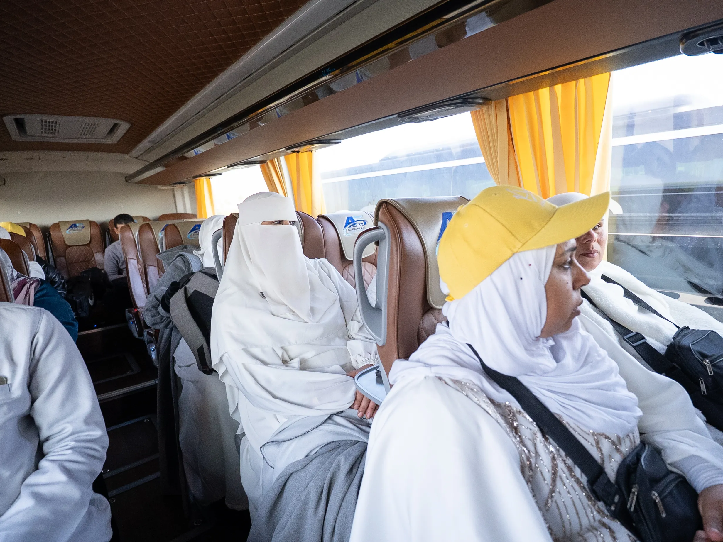A large group of Muslim pilgrims gather for prayer at the Kaaba, Masjid al-Haram, Mecca.